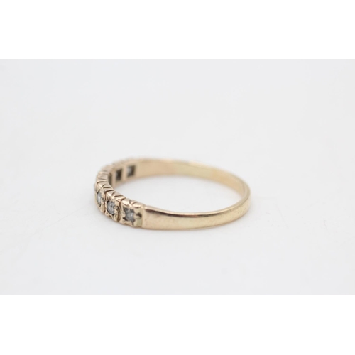 24 - 9ct gold diamond seven stone half eternity ring (1.7g) Size Q