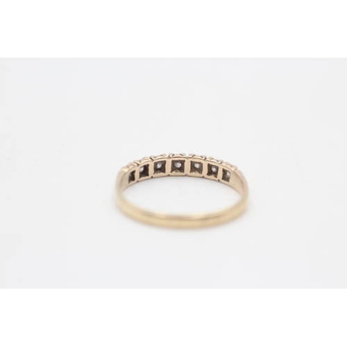 24 - 9ct gold diamond seven stone half eternity ring (1.7g) Size Q