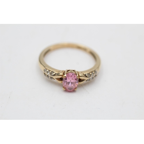 29 - 9ct gold pink gemstone & diamond seven stone dress ring (2.3g) Size O