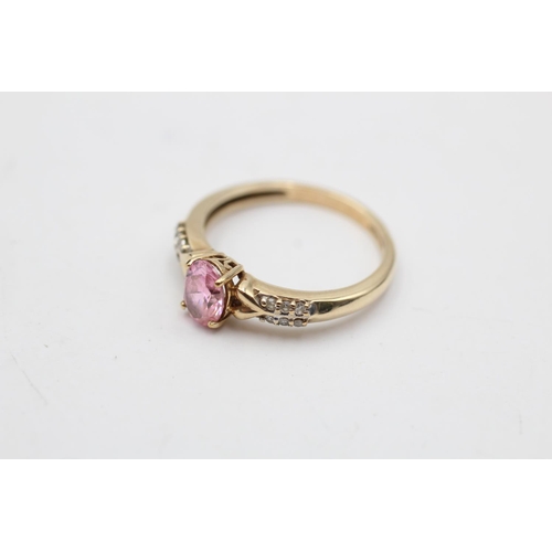 29 - 9ct gold pink gemstone & diamond seven stone dress ring (2.3g) Size O