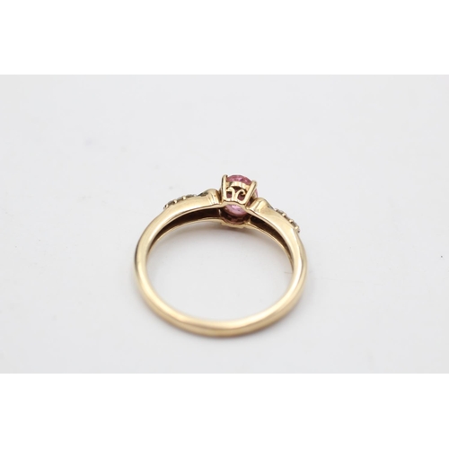 29 - 9ct gold pink gemstone & diamond seven stone dress ring (2.3g) Size O