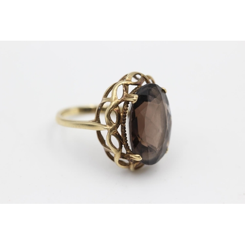 35 - 9ct gold smokey quartz ring (5.2g) Size N