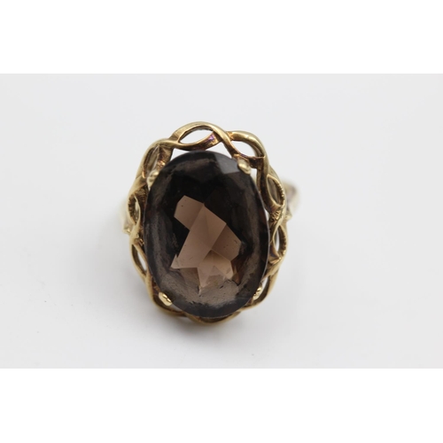 35 - 9ct gold smokey quartz ring (5.2g) Size N