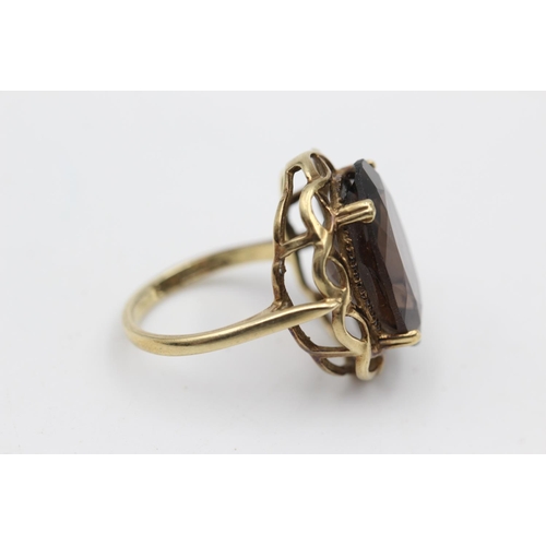 35 - 9ct gold smokey quartz ring (5.2g) Size N