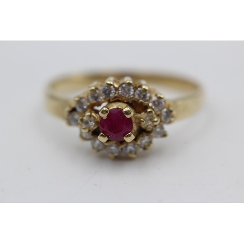 39 - 9ct gold ruby & clear gemstone fancy halo ring (2.8g) Size P