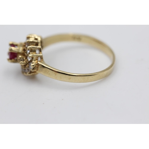 39 - 9ct gold ruby & clear gemstone fancy halo ring (2.8g) Size P