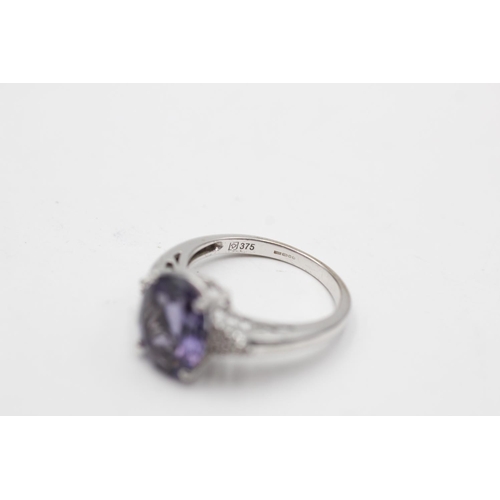 50 - 9ct white gold amethyst & diamond eleven stone dress ring (3.5g) Size M