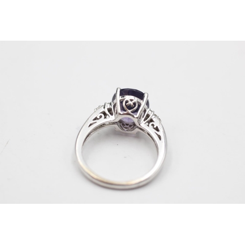 50 - 9ct white gold amethyst & diamond eleven stone dress ring (3.5g) Size M