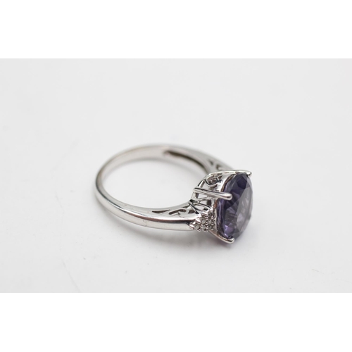 50 - 9ct white gold amethyst & diamond eleven stone dress ring (3.5g) Size M