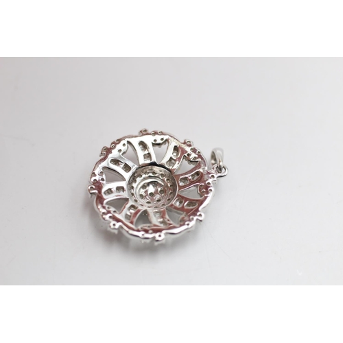 19 - 9ct white gold vintage diamond set sunburst pendant (2.6g)