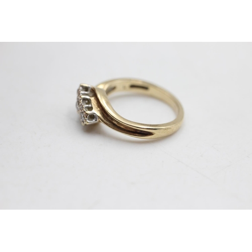 25 - 9ct gold vintage diamond three stone bypass ring (3g) size K