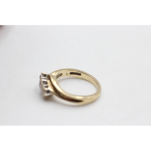 25 - 9ct gold vintage diamond three stone bypass ring (3g) size K