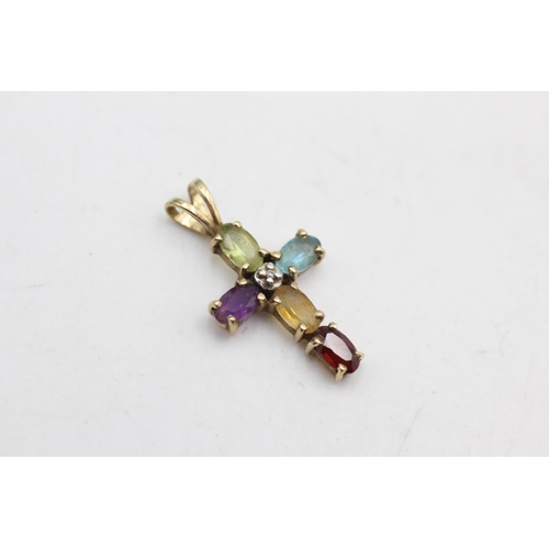 53 - 2 x 9ct gold cross pendants inc. Diamond, peridot, topaz, amethyst (2.2g)