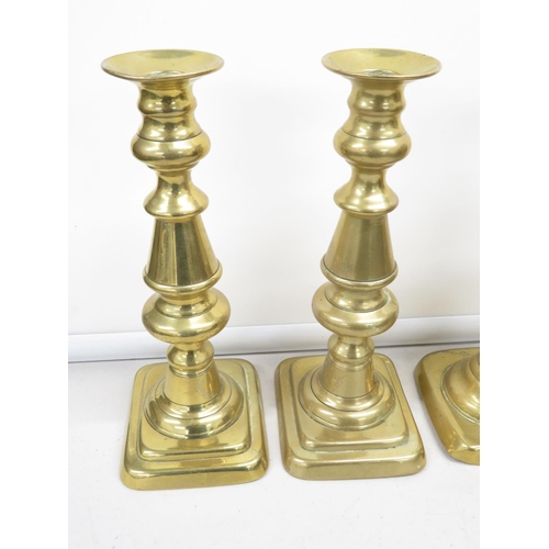 126 - 2x pairs of early brass candlesticks 10