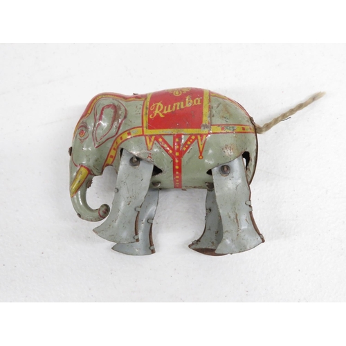 179 - Early tin plate made in Germany DRGM GESCH RUMBA The Elephant toy