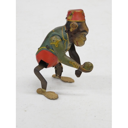 180 - Early tin plate mechanical monkey with made in US zone mark