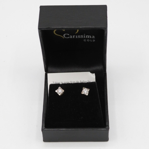 190 - Pair of 9ct diamond stud earrings boxed