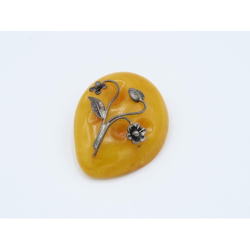 27 - Pair of amber brooches butterscotch colour 34g