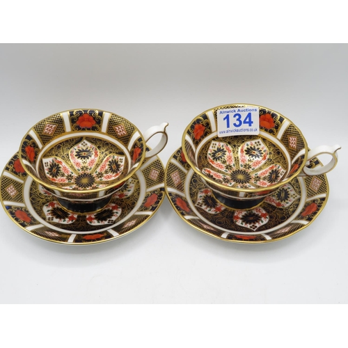 134 - 2x Royal Crown Derby 1128 tea cups and saucers