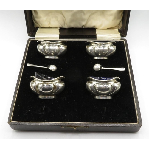 265 - Boxed set of 4x silver salts with liners and 2x silver spoons