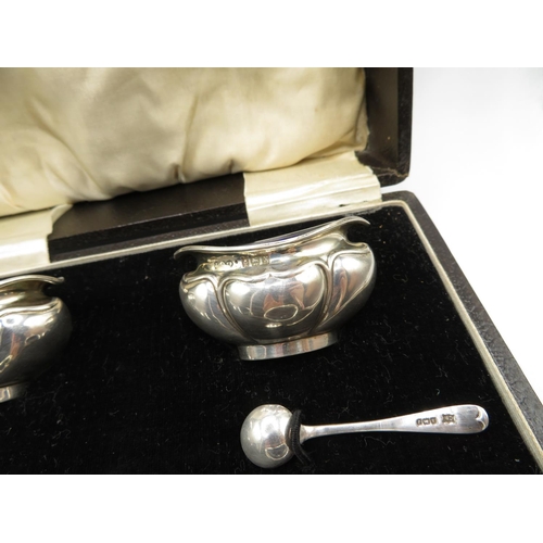 265 - Boxed set of 4x silver salts with liners and 2x silver spoons