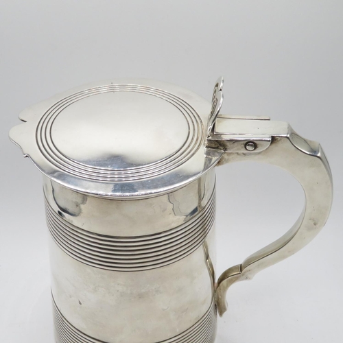 274 - Early silver milk or water lidded jug with London HM tight hinge good condition 831g