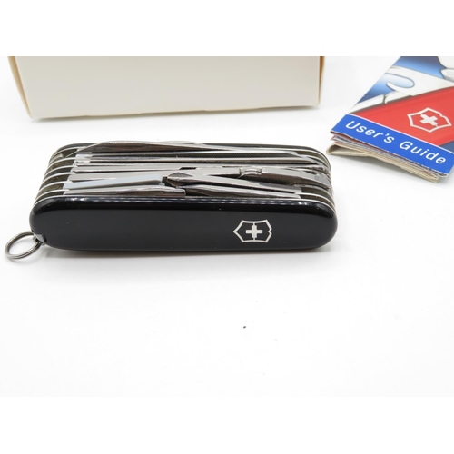 44 - Swiss Army Knife black handle new condition in box