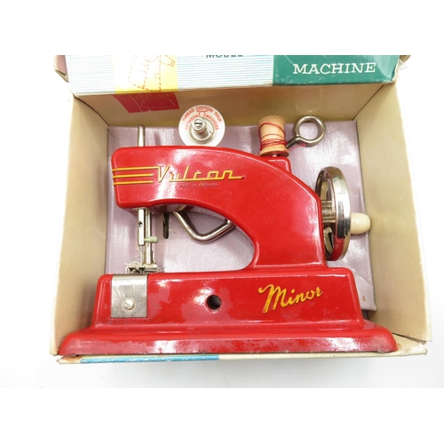 81 - Vulcan Minor boxed sewing machine and Toy Town telephone exchange boxed