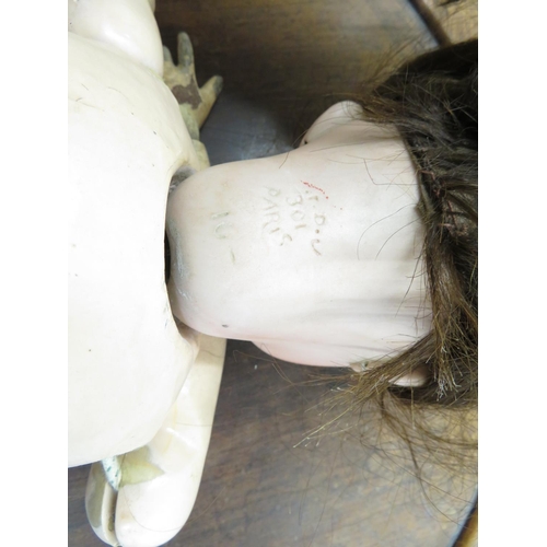 166 - Porcelain head papier mache bodied doll marked 301 Paris on back of neck