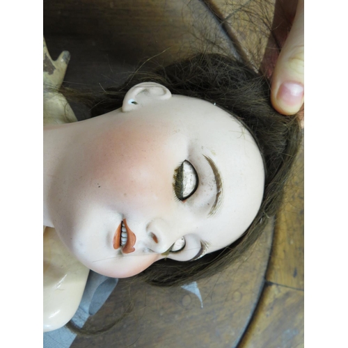 166 - Porcelain head papier mache bodied doll marked 301 Paris on back of neck