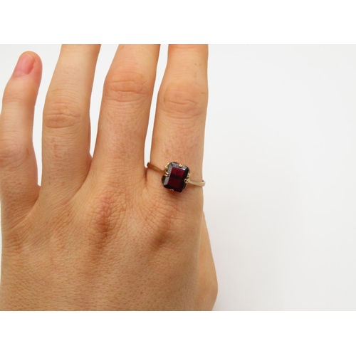 103 - 9ct gold and garnet ring size V  2.1g