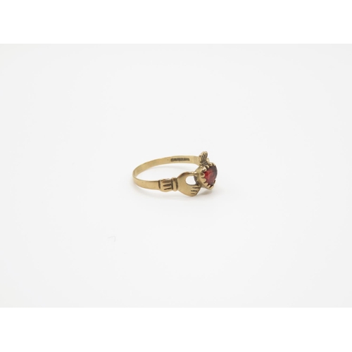 105 - 9ct gold and garnet Claddagh ring size L  1.2g