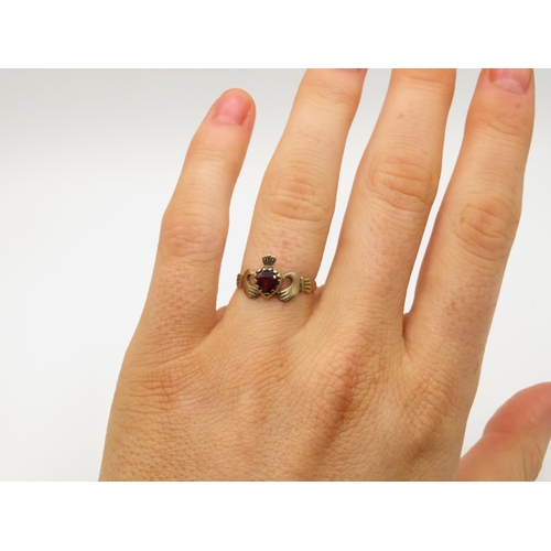 105 - 9ct gold and garnet Claddagh ring size L  1.2g