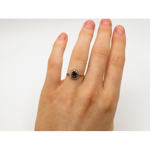 106 - 9ct gold and garnet ring  size L  2g