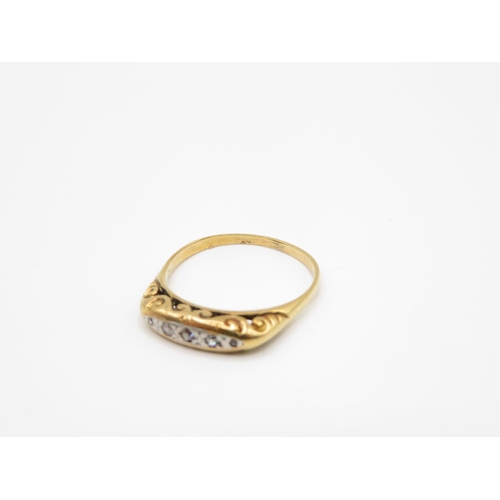 129 - 18ct gold and diamond gypsy style ring size P  2.6g