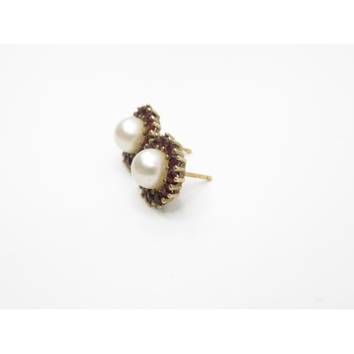148 - Pair of 9ct pearl and garnet earrings  4.2g