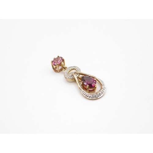 149 - 9ct diamond and garnet pendant 2.2g