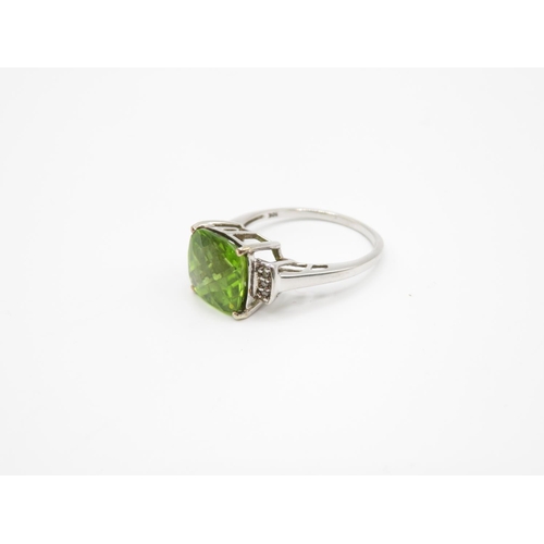 150 - 9ct peridot and diamond ring size Q  3.6g
