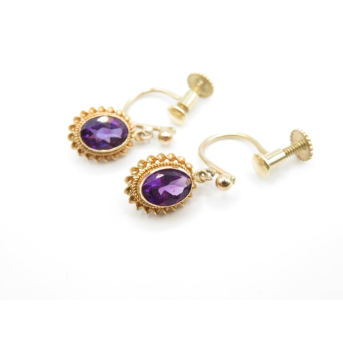 154 - Set of 9ct gold and amethyst earrings screw back 2.5g