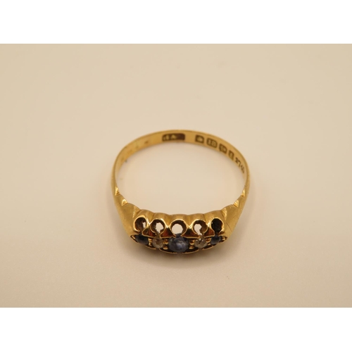 68 - 18ct gold diamond and sapphire gypsy set ring size Q 2.7g