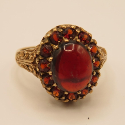 69 - 9ct gold and garnet ring size P  4.4g