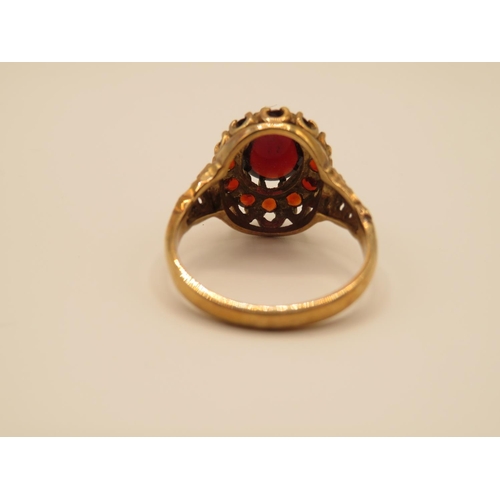 69 - 9ct gold and garnet ring size P  4.4g