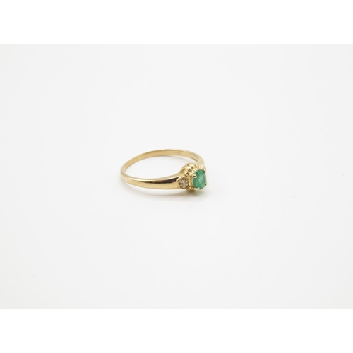 75 - 14ct and emerald ring size O  1.8g