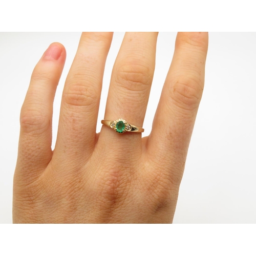 75 - 14ct and emerald ring size O  1.8g