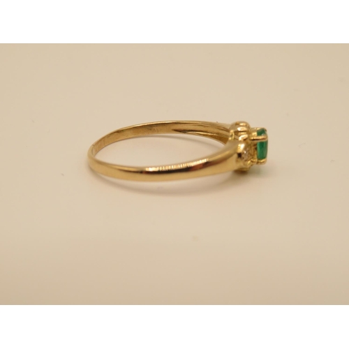 75 - 14ct and emerald ring size O  1.8g