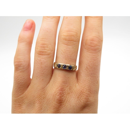 78 - 9ct gold gypsy set sapphire ring size O  2.6g