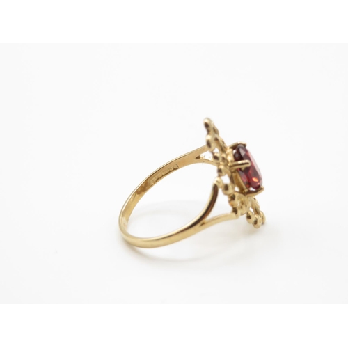 94 - 9ct gold and garnet ring size M  1.8g