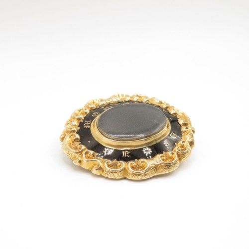 10 - 18ct front and 9ct back Memorium brooch with woven hair and black enamel with original leather fitte... 