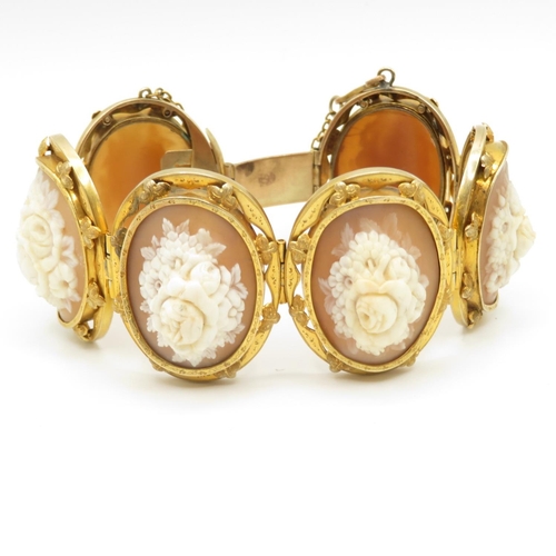 22 - 14ct gold bracelet with carved shell cameo inserts each panel measuring 40mm long x 30mm wide  total... 