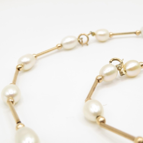 26 - 9ct gold and pearl necklace and bracelet - necklace measures 45cm long, bracelet measures 20cm - 15.... 